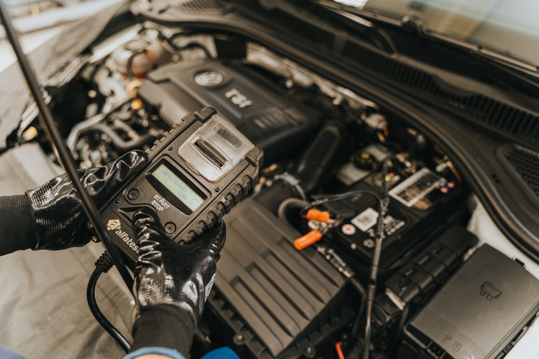 OBD-II port under dashboard used in CAN bus hacking research